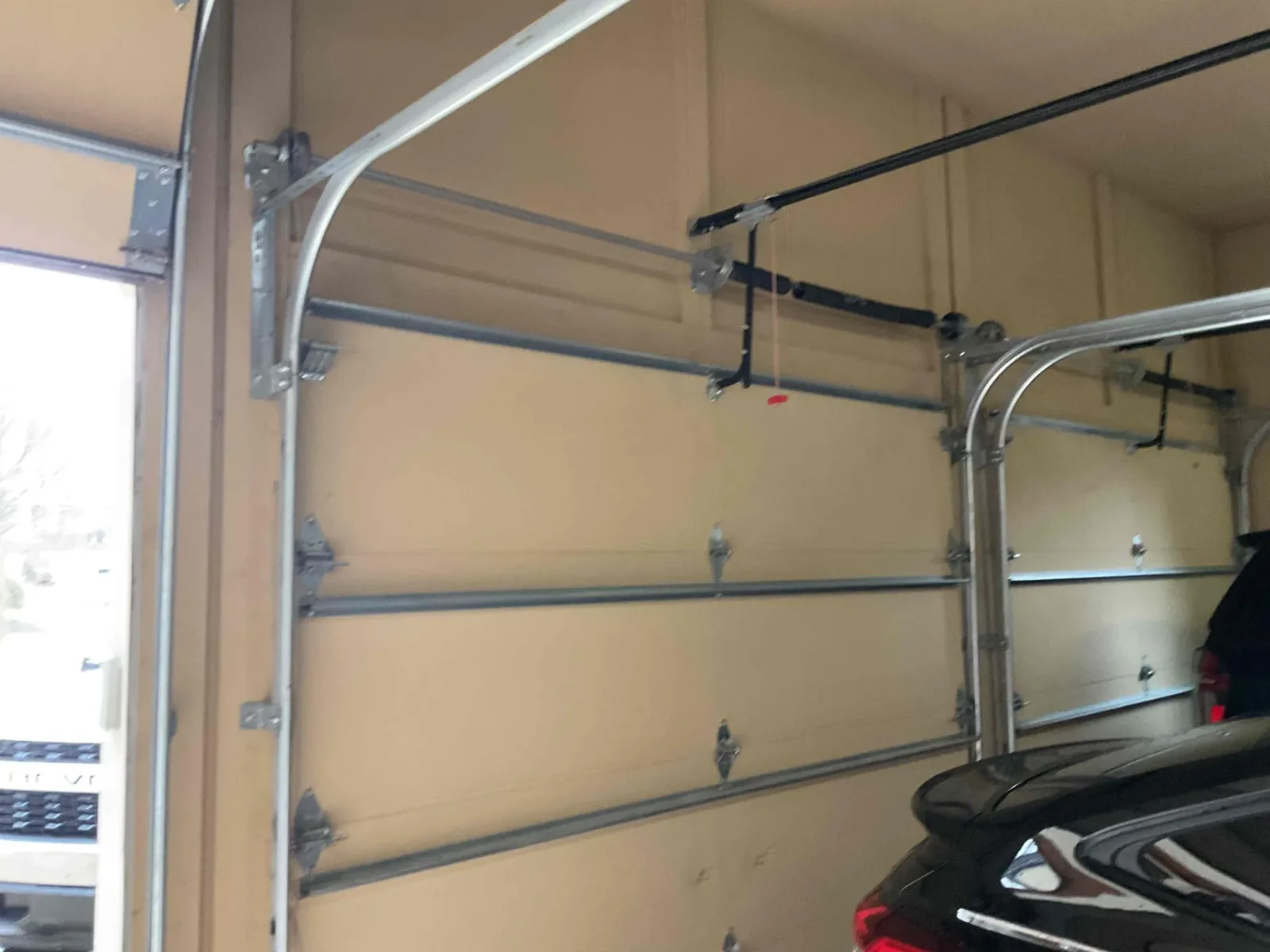 Garage Door Track Repair in Milton, GA